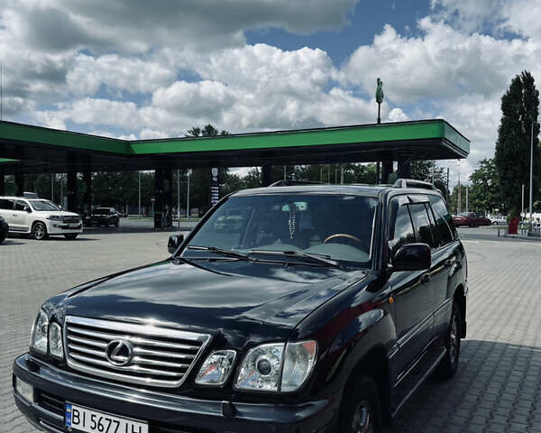 Чорний Лексус ЛХ, об'ємом двигуна 4.67 л та пробігом 225 тис. км за 15000 $, фото 1 на Automoto.ua