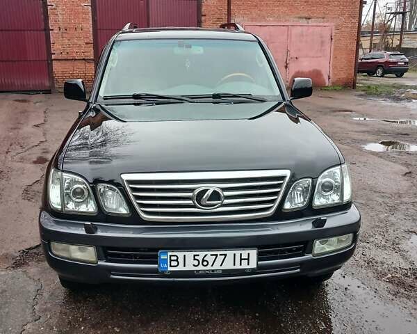 Чорний Лексус ЛХ, об'ємом двигуна 4.7 л та пробігом 240 тис. км за 14800 $, фото 1 на Automoto.ua
