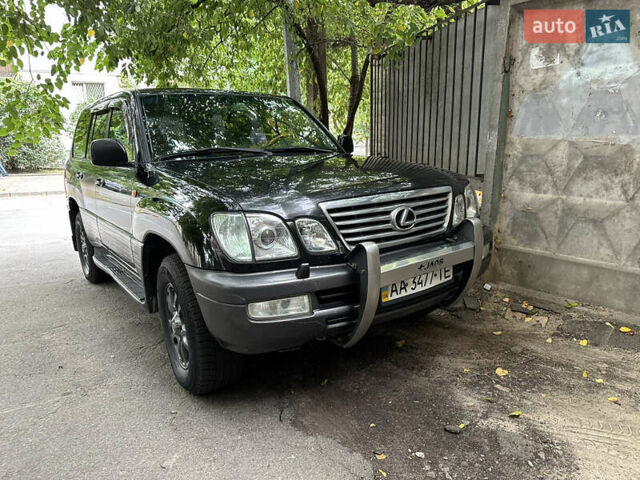 Чорний Лексус ЛХ, об'ємом двигуна 4.66 л та пробігом 402 тис. км за 16100 $, фото 1 на Automoto.ua