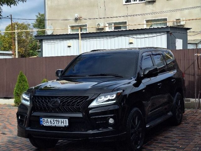 Черный Лексус ЛХ, объемом двигателя 5.7 л и пробегом 240 тыс. км за 26500 $, фото 1 на Automoto.ua