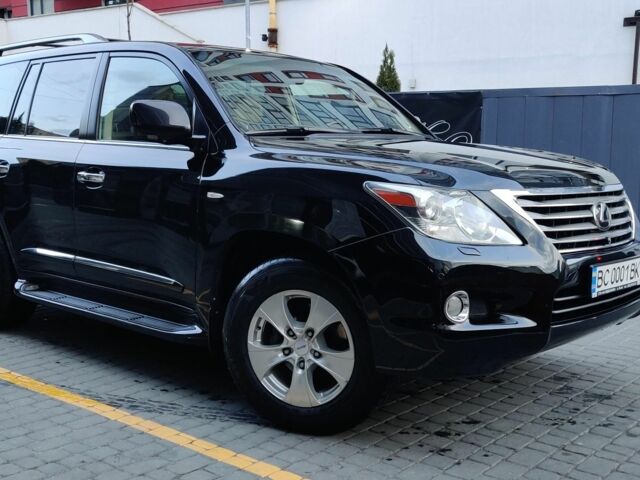 Черный Лексус ЛХ, объемом двигателя 5.7 л и пробегом 390 тыс. км за 22500 $, фото 1 на Automoto.ua