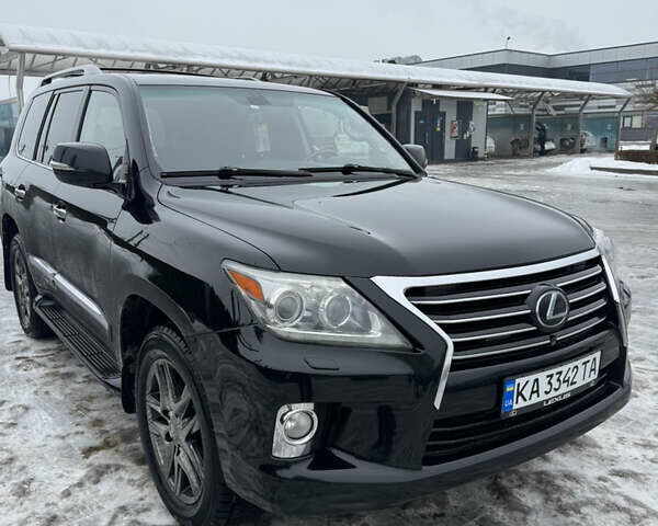 Черный Лексус ЛХ, объемом двигателя 5.66 л и пробегом 330 тыс. км за 24500 $, фото 1 на Automoto.ua