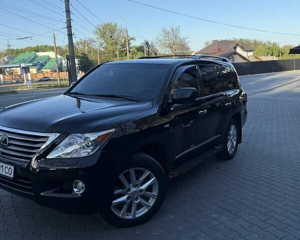 Черный Лексус ЛХ, объемом двигателя 5.66 л и пробегом 380 тыс. км за 26500 $, фото 1 на Automoto.ua