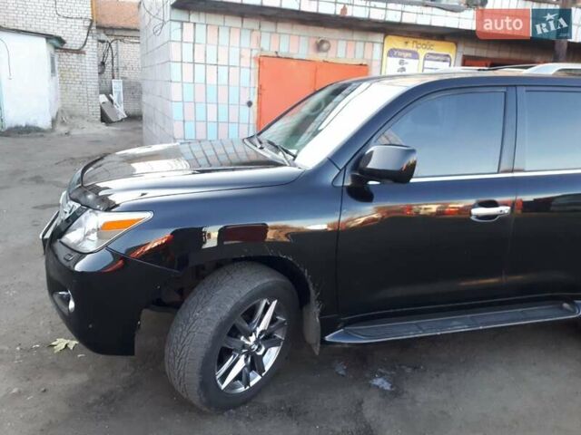 Черный Лексус ЛХ, объемом двигателя 5.7 л и пробегом 280 тыс. км за 32000 $, фото 1 на Automoto.ua