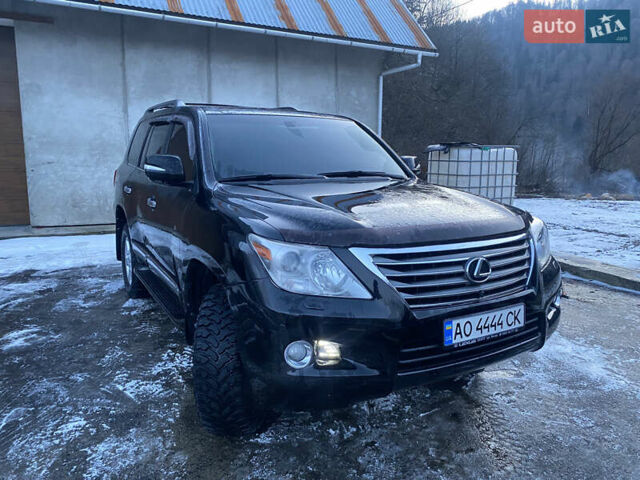 Черный Лексус ЛХ, объемом двигателя 5.66 л и пробегом 180 тыс. км за 33333 $, фото 1 на Automoto.ua