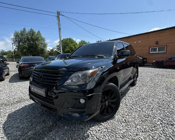 Чорний Лексус ЛХ, об'ємом двигуна 5.66 л та пробігом 240 тис. км за 24500 $, фото 1 на Automoto.ua