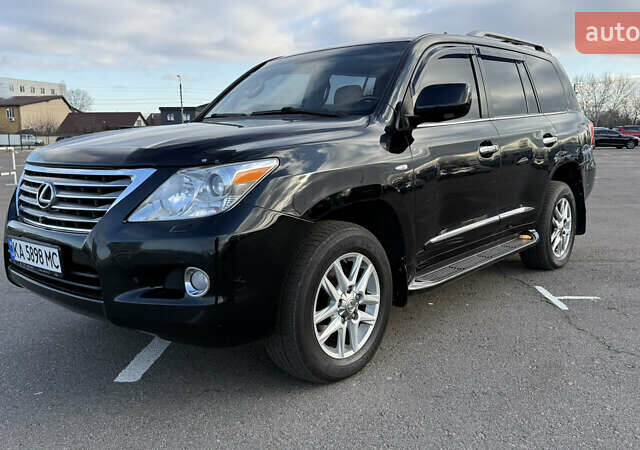 Черный Лексус ЛХ, объемом двигателя 5.66 л и пробегом 276 тыс. км за 20900 $, фото 1 на Automoto.ua