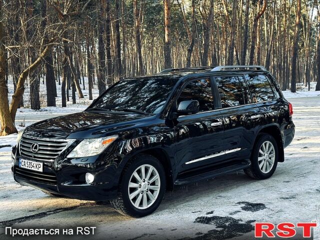 Черный Лексус ЛХ, объемом двигателя 5.7 л и пробегом 35000 тыс. км за 24500 $, фото 1 на Automoto.ua
