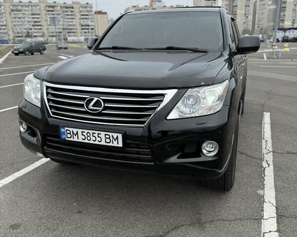 Черный Лексус ЛХ, объемом двигателя 5.66 л и пробегом 322 тыс. км за 21700 $, фото 1 на Automoto.ua