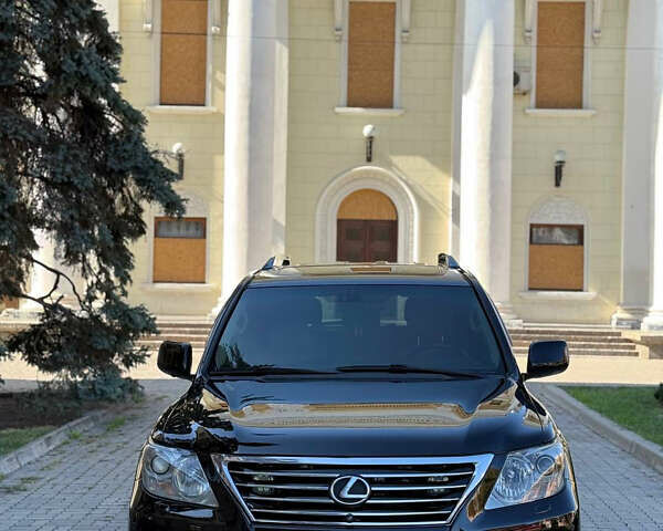 Черный Лексус ЛХ, объемом двигателя 5.66 л и пробегом 253 тыс. км за 26000 $, фото 1 на Automoto.ua