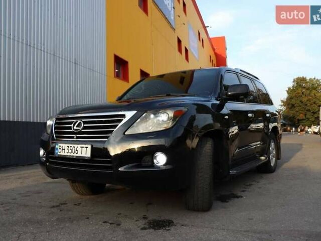 Черный Лексус ЛХ, объемом двигателя 5.66 л и пробегом 350 тыс. км за 20000 $, фото 1 на Automoto.ua