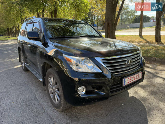 Черный Лексус ЛХ, объемом двигателя 5.66 л и пробегом 278 тыс. км за 23500 $, фото 1 на Automoto.ua