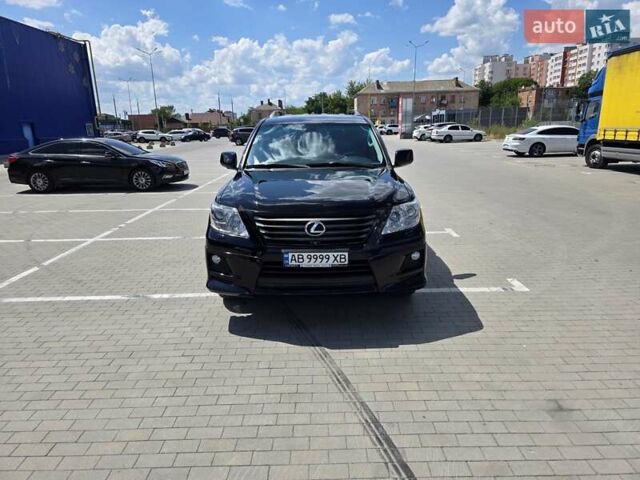 Черный Лексус ЛХ, объемом двигателя 5.66 л и пробегом 295 тыс. км за 27777 $, фото 1 на Automoto.ua