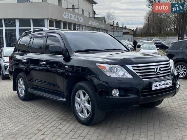 Черный Лексус ЛХ, объемом двигателя 5.66 л и пробегом 310 тыс. км за 25500 $, фото 1 на Automoto.ua