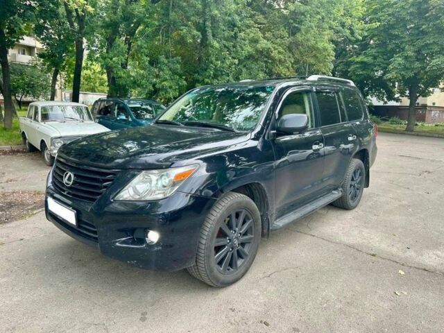 Черный Лексус ЛХ, объемом двигателя 5.7 л и пробегом 380 тыс. км за 22222 $, фото 1 на Automoto.ua
