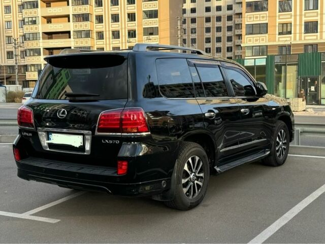 Черный Лексус ЛХ, объемом двигателя 5.7 л и пробегом 170 тыс. км за 31000 $, фото 1 на Automoto.ua