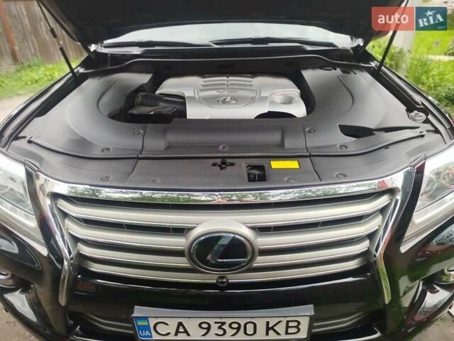 Черный Лексус ЛХ, объемом двигателя 5.66 л и пробегом 167 тыс. км за 32000 $, фото 1 на Automoto.ua