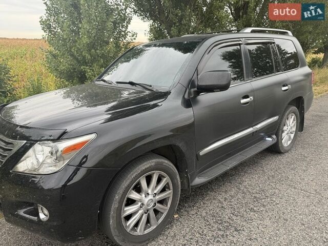 Чорний Лексус ЛХ, об'ємом двигуна 5.7 л та пробігом 350 тис. км за 25021 $, фото 1 на Automoto.ua