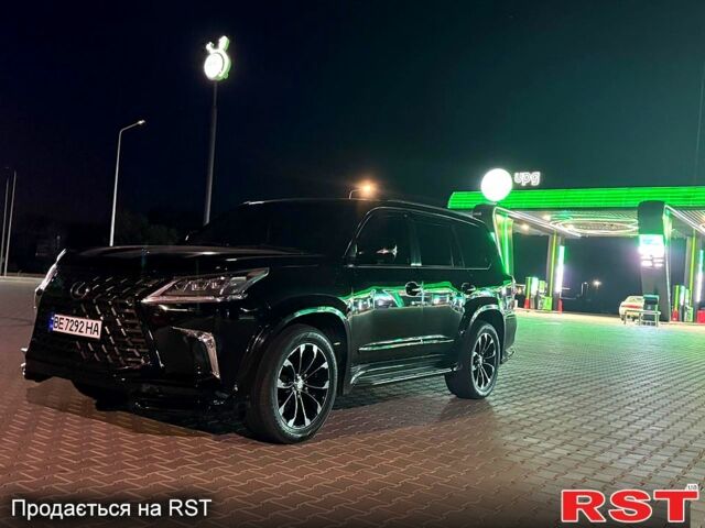 Черный Лексус ЛХ, объемом двигателя 5.7 л и пробегом 195 тыс. км за 35700 $, фото 1 на Automoto.ua