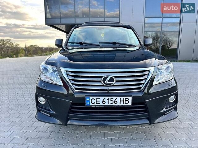 Черный Лексус ЛХ, объемом двигателя 5.66 л и пробегом 250 тыс. км за 26500 $, фото 1 на Automoto.ua