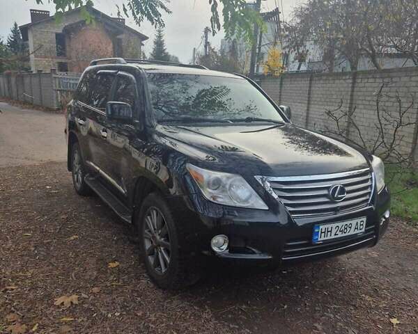 Черный Лексус ЛХ, объемом двигателя 5.66 л и пробегом 220 тыс. км за 29500 $, фото 1 на Automoto.ua
