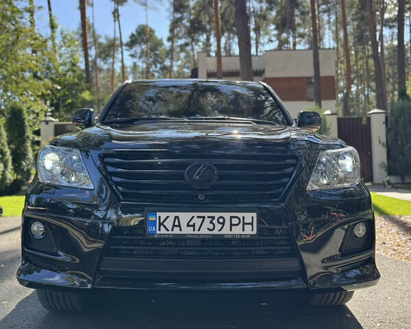 Черный Лексус ЛХ, объемом двигателя 5.66 л и пробегом 113 тыс. км за 38500 $, фото 1 на Automoto.ua
