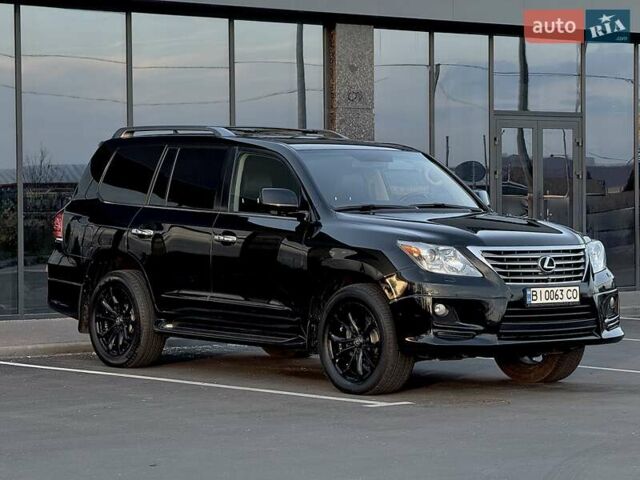 Черный Лексус ЛХ, объемом двигателя 5.66 л и пробегом 246 тыс. км за 31000 $, фото 1 на Automoto.ua