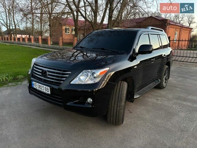 Черный Лексус ЛХ, объемом двигателя 5.66 л и пробегом 165 тыс. км за 31500 $, фото 1 на Automoto.ua