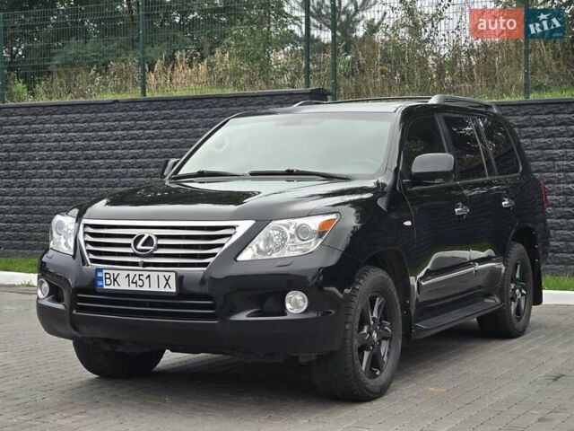 Черный Лексус ЛХ, объемом двигателя 5.66 л и пробегом 238 тыс. км за 25700 $, фото 1 на Automoto.ua