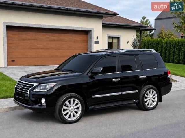 Черный Лексус ЛХ, объемом двигателя 5.7 л и пробегом 192 тыс. км за 28700 $, фото 1 на Automoto.ua