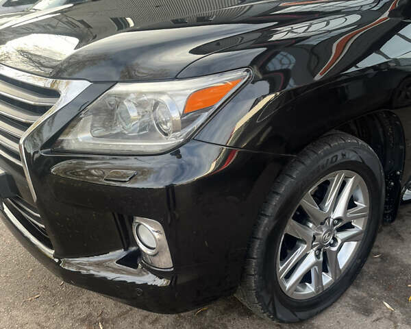 Чорний Лексус ЛХ, об'ємом двигуна 5.66 л та пробігом 214 тис. км за 38500 $, фото 1 на Automoto.ua