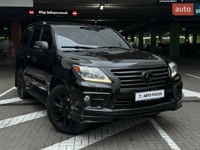 Черный Лексус ЛХ, объемом двигателя 5.66 л и пробегом 285 тыс. км за 32990 $, фото 1 на Automoto.ua