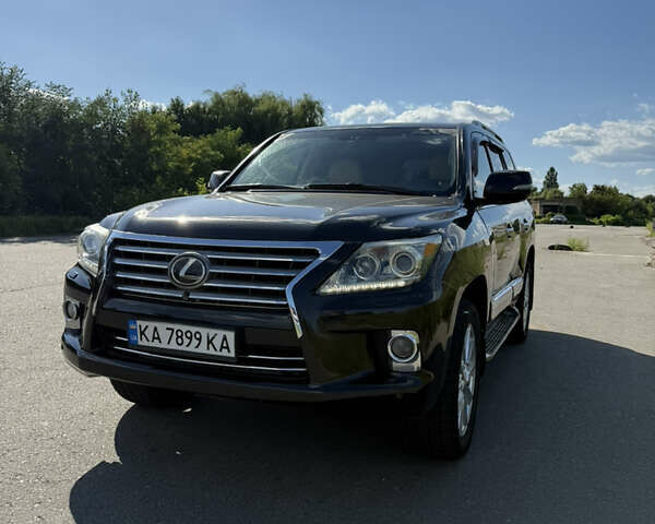 Черный Лексус ЛХ, объемом двигателя 5.66 л и пробегом 290 тыс. км за 34700 $, фото 1 на Automoto.ua
