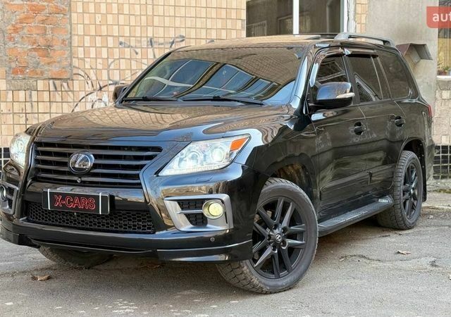 Черный Лексус ЛХ, объемом двигателя 5.7 л и пробегом 131 тыс. км за 37700 $, фото 1 на Automoto.ua