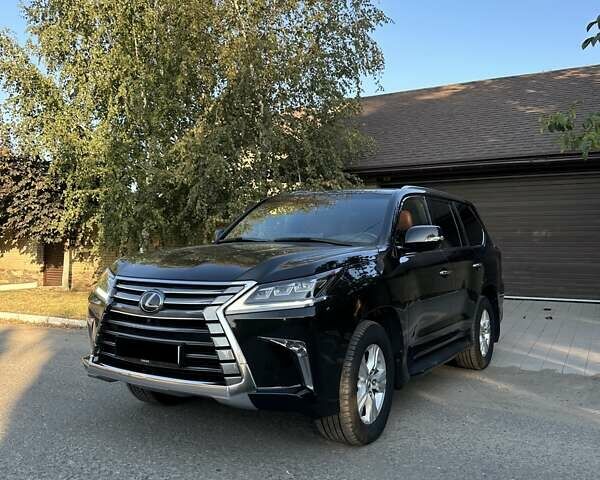 Черный Лексус ЛХ, объемом двигателя 4.46 л и пробегом 150 тыс. км за 64500 $, фото 1 на Automoto.ua