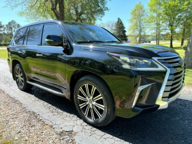 Черный Лексус ЛХ, объемом двигателя 5.7 л и пробегом 45 тыс. км за 36000 $, фото 1 на Automoto.ua