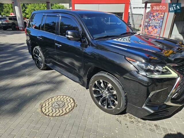 Черный Лексус ЛХ, объемом двигателя 4.46 л и пробегом 57 тыс. км за 82000 $, фото 1 на Automoto.ua
