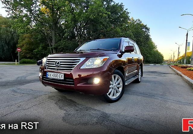 Червоний Лексус ЛХ, об'ємом двигуна 5.7 л та пробігом 245 тис. км за 26500 $, фото 1 на Automoto.ua