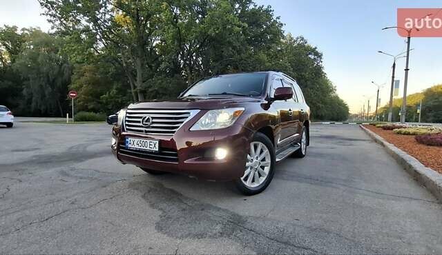 Червоний Лексус ЛХ, об'ємом двигуна 5.66 л та пробігом 245 тис. км за 26500 $, фото 1 на Automoto.ua