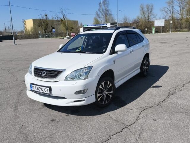 Білий Лексус РХ, об'ємом двигуна 3.5 л та пробігом 252 тис. км за 12500 $, фото 1 на Automoto.ua
