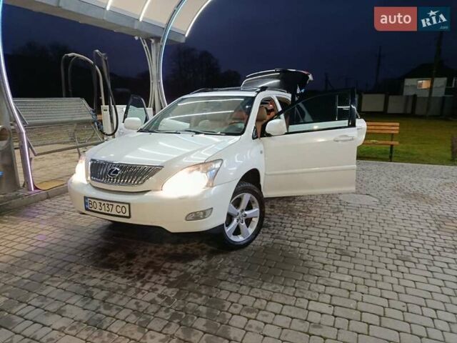 Белый Лексус РХ, объемом двигателя 3.5 л и пробегом 240 тыс. км за 8700 $, фото 1 на Automoto.ua