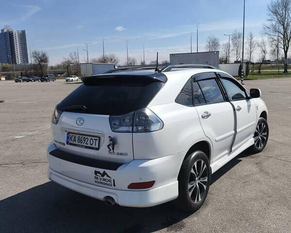 Белый Лексус РХ, объемом двигателя 3.5 л и пробегом 252 тыс. км за 12500 $, фото 1 на Automoto.ua