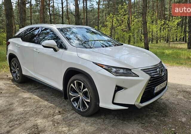 Белый Лексус РХ, объемом двигателя 2 л и пробегом 105 тыс. км за 35400 $, фото 1 на Automoto.ua