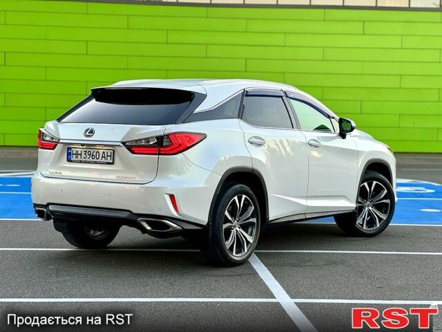 Белый Лексус РХ, объемом двигателя 2 л и пробегом 70 тыс. км за 33900 $, фото 1 на Automoto.ua