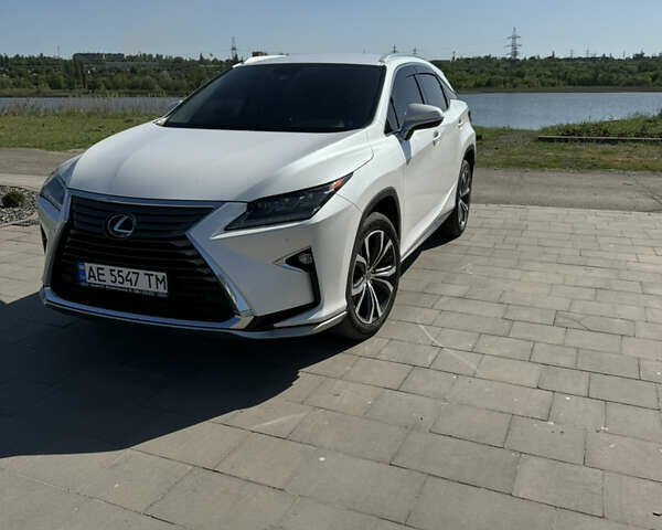 Белый Лексус РХ, объемом двигателя 2 л и пробегом 142 тыс. км за 31000 $, фото 1 на Automoto.ua