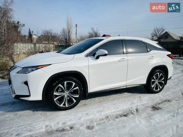 Белый Лексус РХ, объемом двигателя 2 л и пробегом 145 тыс. км за 28000 $, фото 1 на Automoto.ua