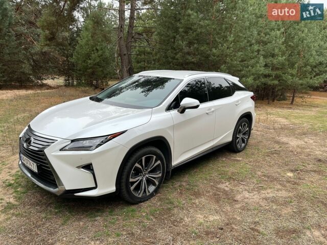 Білий Лексус РХ, об'ємом двигуна 2 л та пробігом 150 тис. км за 35500 $, фото 1 на Automoto.ua