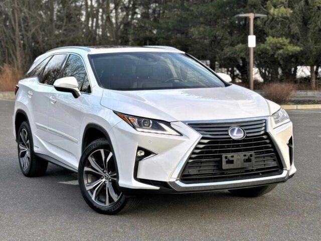 Белый Лексус РХ, объемом двигателя 3.5 л и пробегом 33 тыс. км за 30000 $, фото 1 на Automoto.ua