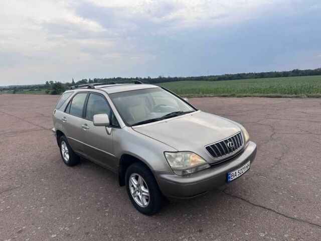 Бежевий Лексус РХ, об'ємом двигуна 3 л та пробігом 300 тис. км за 4995 $, фото 1 на Automoto.ua