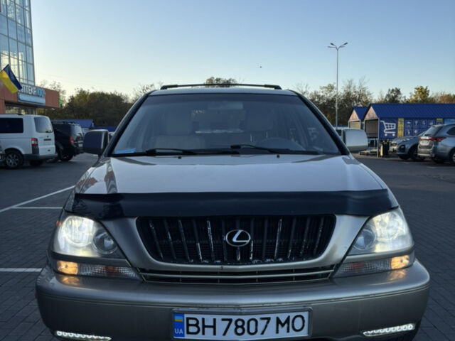 Бежевий Лексус РХ, об'ємом двигуна 3 л та пробігом 327 тис. км за 5700 $, фото 1 на Automoto.ua
